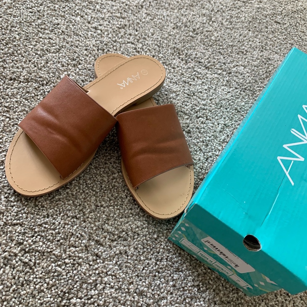 Slide on sandal. Bought at boutique. Sz 7